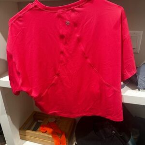 Pink short sleeve lulemon workout shirt size 6